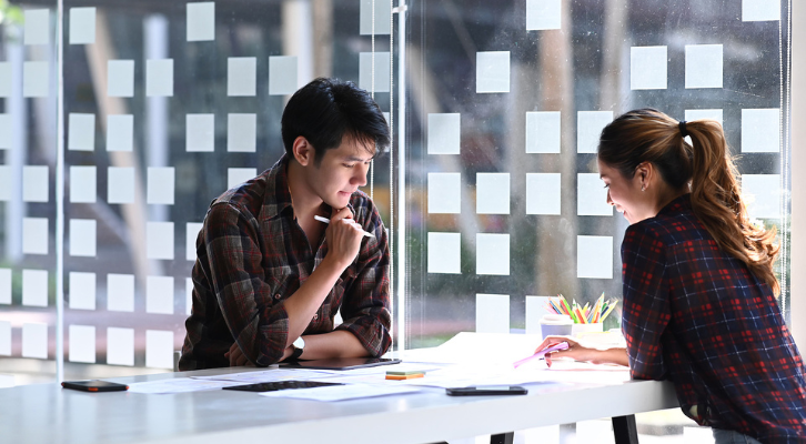 Team working at desk by window