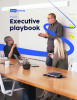 Image of a group of people talking with the words Executive Playbook
