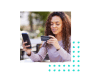 Image of woman holding credit card and cell phone