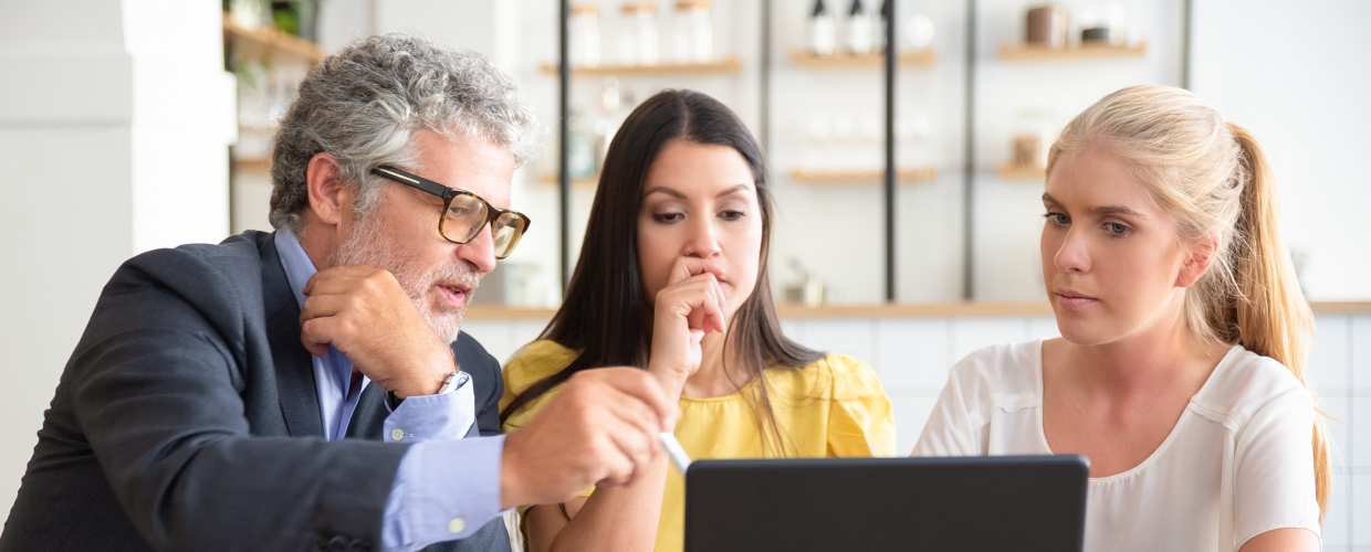 HERO Image - Mature-professional-explaining project-details-to-young-customers