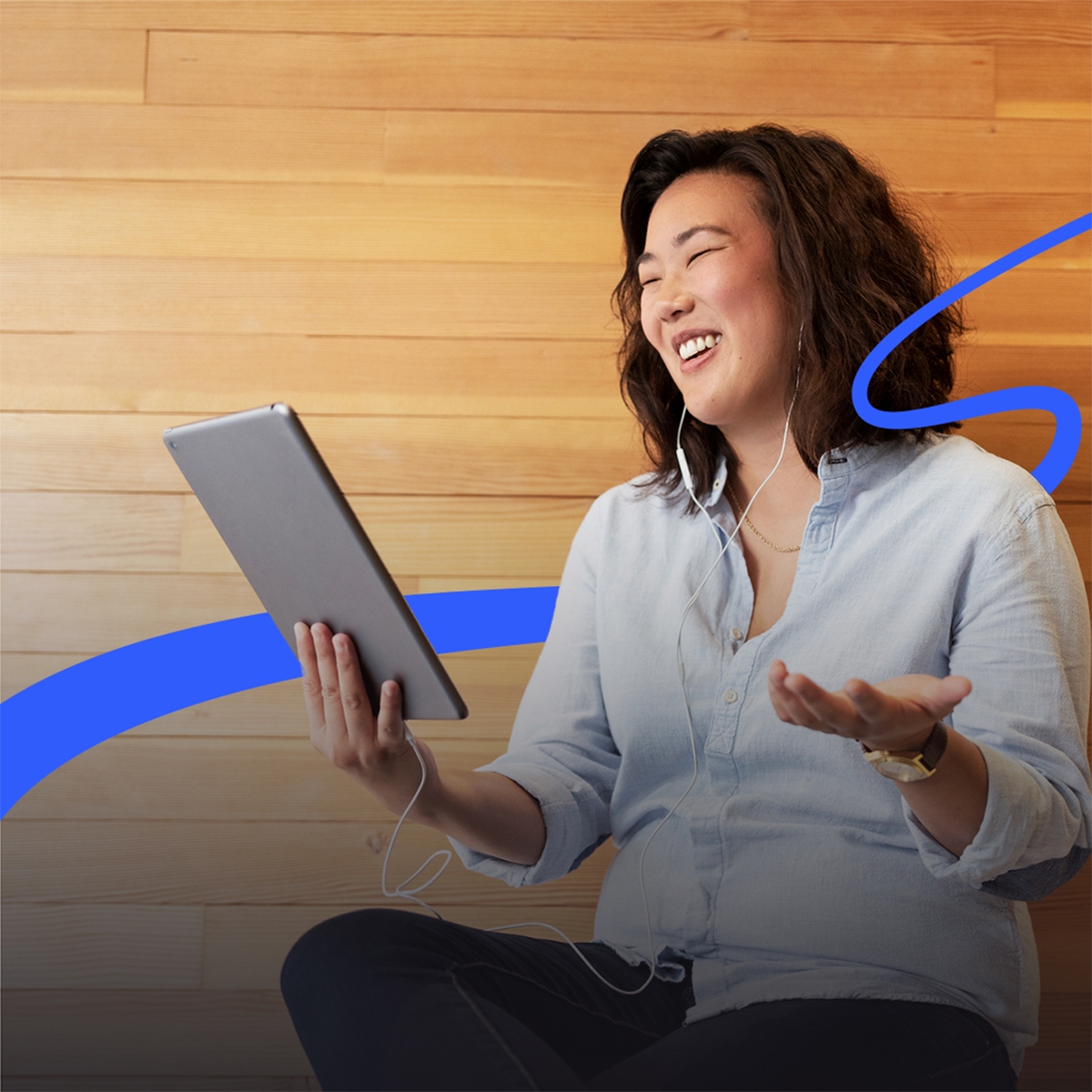 Miya a contributor holding a tablet with path graphic on images, taking a test