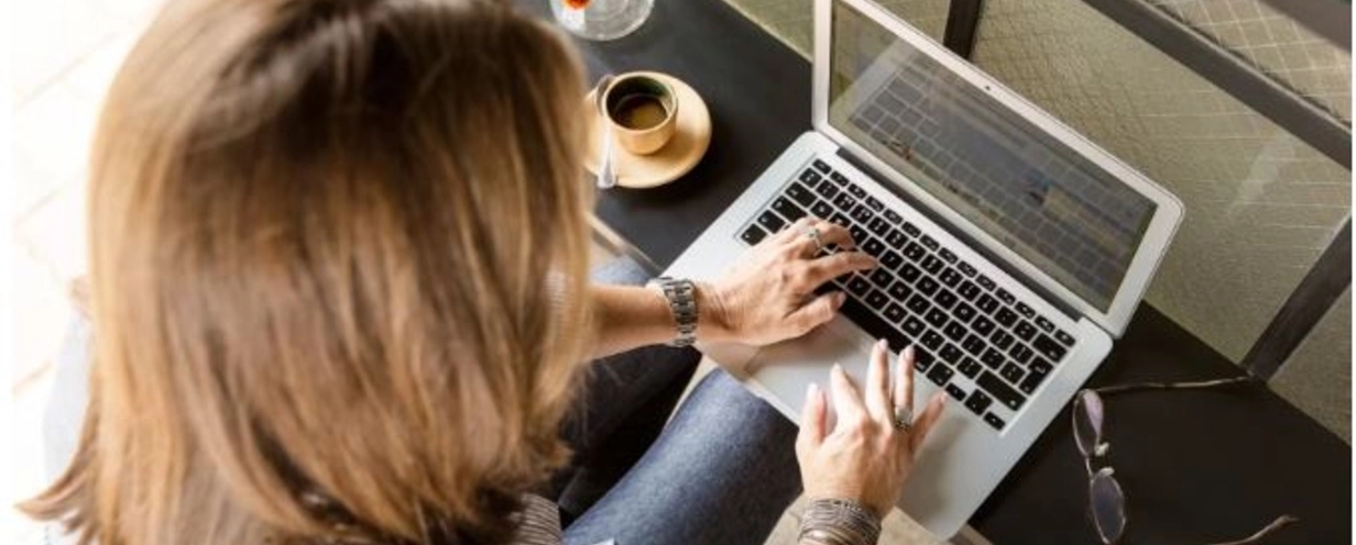 image of woman on a laptop