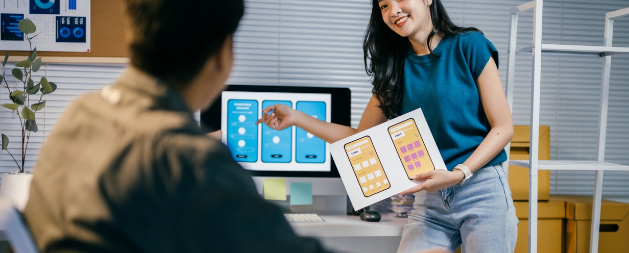 two-asian-ui-ux-designers-are-working-on-a-new-app