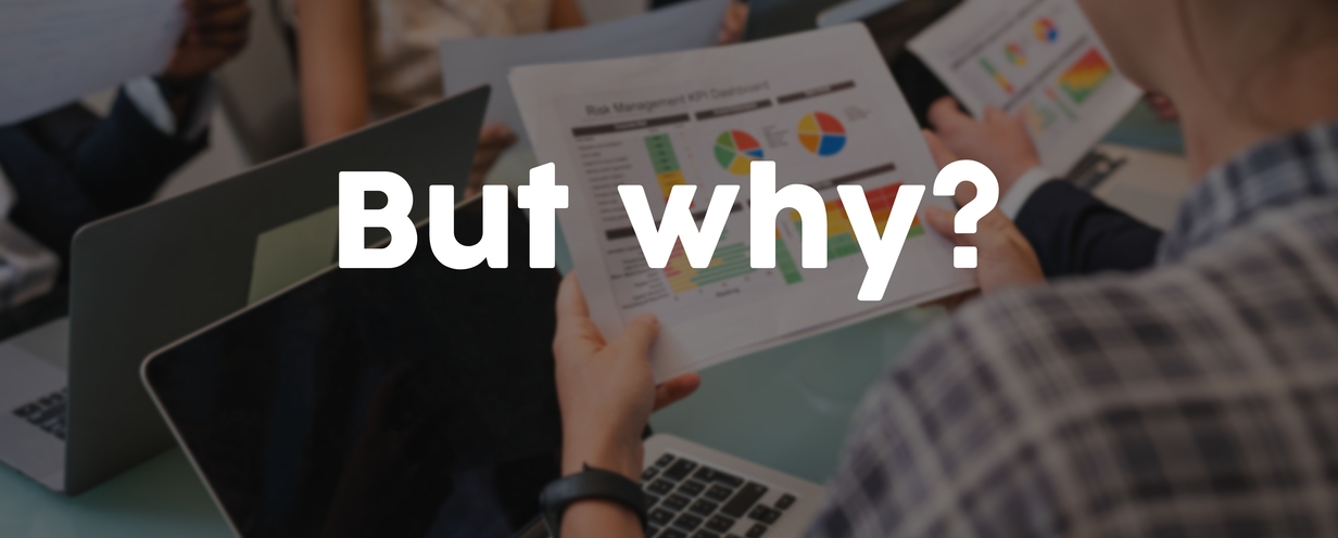 Image of people looking at analytics, but asking the question why