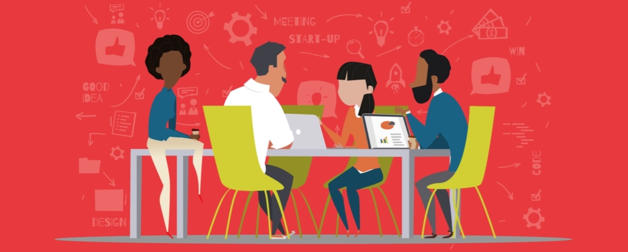 people sitting round a table doing a workshop