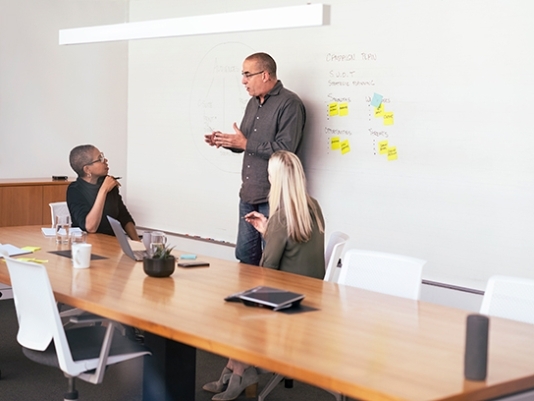 man at whiteboard