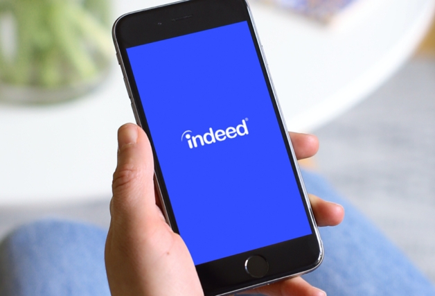 Photo showing indeed logo on mobile phone