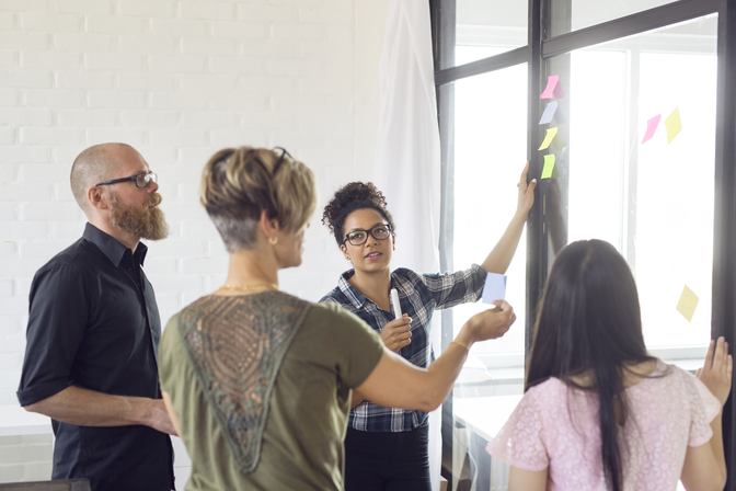 user-centered-design-team-collaboration-during-a-brainstorming-session