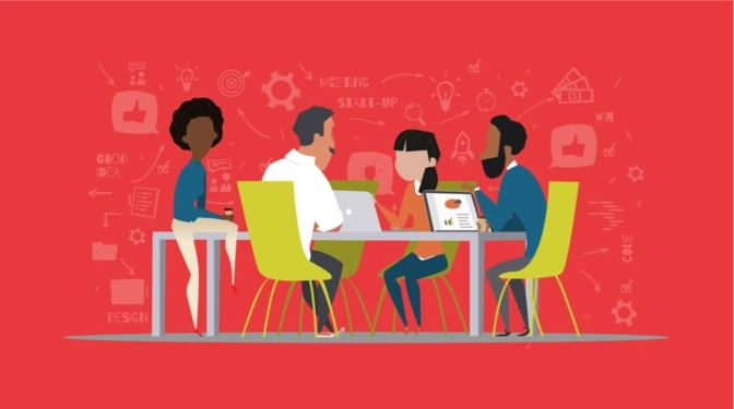 people sitting round a table doing a workshop