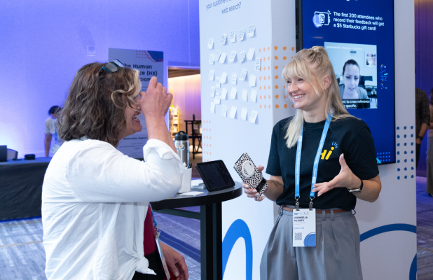 2 females at a UserTesting conference