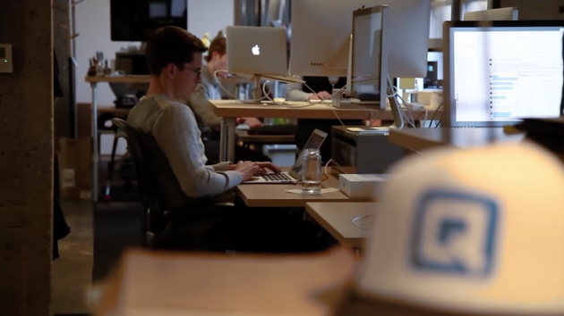 The Quip team writing code in their office